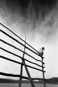 Eikoh Hosoe - Hijikata crouching on a fence - Kamaitachi