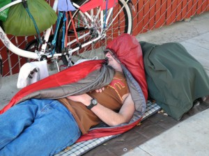 young homeless man resting